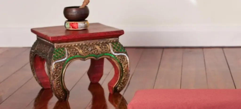 meditation table with singing bowl on top